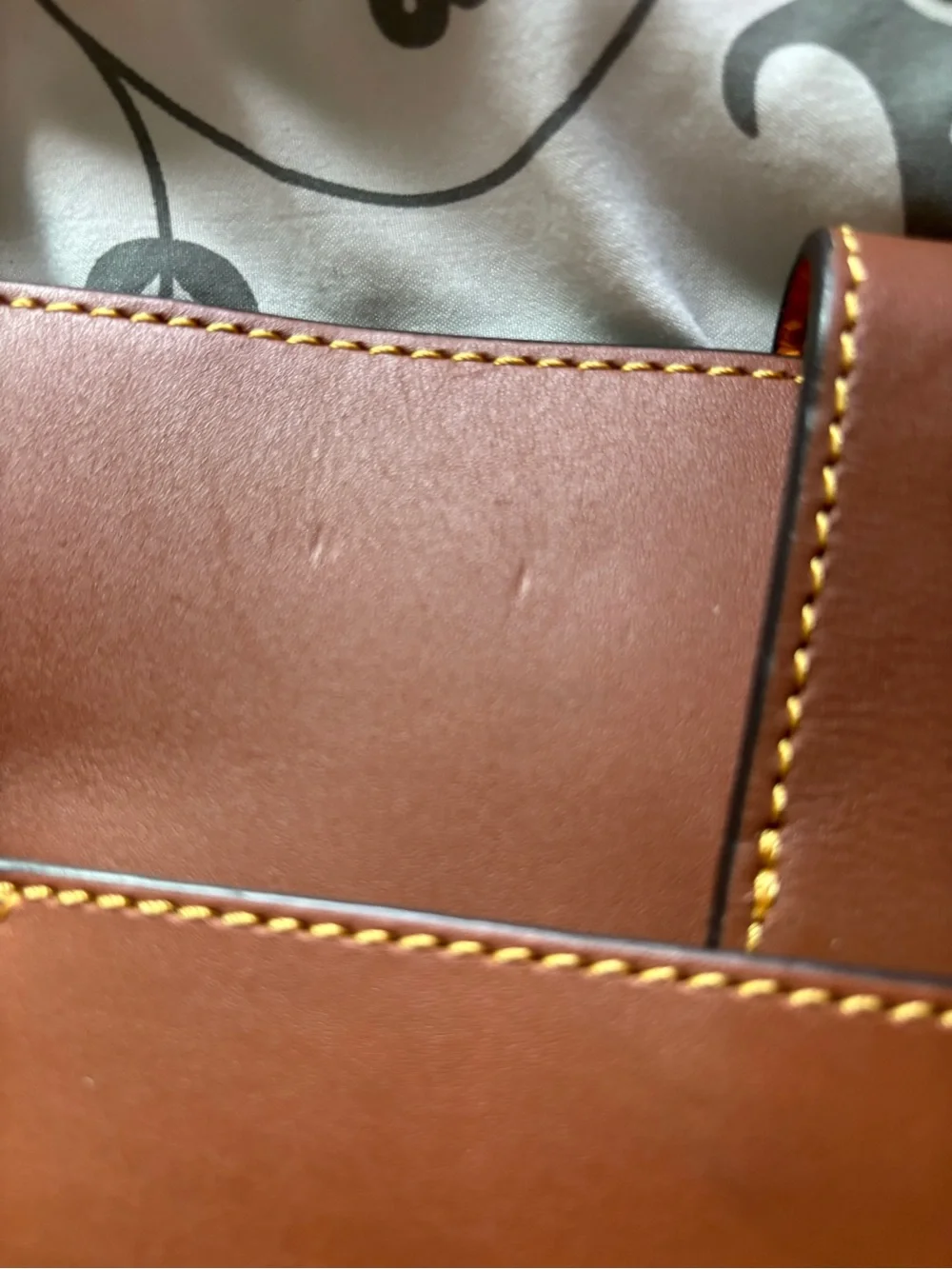 Dooney & Bourke Brown Leather Messenger with Gold Hardware Accent